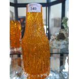 A Whitefriars orange glass bark effect bottle vase, cylindrical, 20cm high