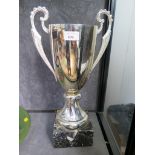 A silver plated trophy on polished alabaster base 45cm