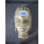 A soapstone Buddhist mask, 15.5cm high
