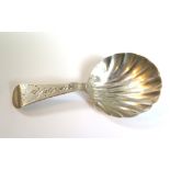 A George III silver caddy spoon with shell bowl