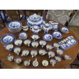 A Booths 'Real Old Willow' pattern part breakfast and dinner service, with tea and coffee pots, cups