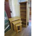 A nest of three light oak tables, and a CD rack (2)