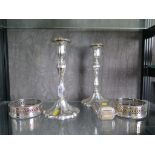 A pair of silver plated candlesticks 27cm, pair of coasters and a butter dish with cover