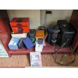 An Olympus OM20 SLR camera, a Kowa SLR camera (with box), a Zenit E SLR camera (with box), a