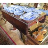 A William IV mahogany Pembroke table, the rectangular drop leaves over a frieze drawer on a square