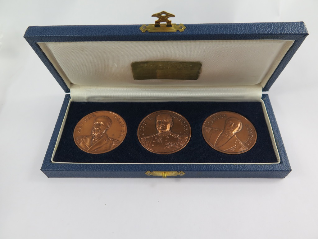 A set of three Chilean medallions 'Class of Heroes' depicting Arturo Prat, Juan J. Latorre, and