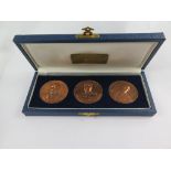 A set of three Chilean medallions 'Class of Heroes' depicting Arturo Prat, Juan J. Latorre, and