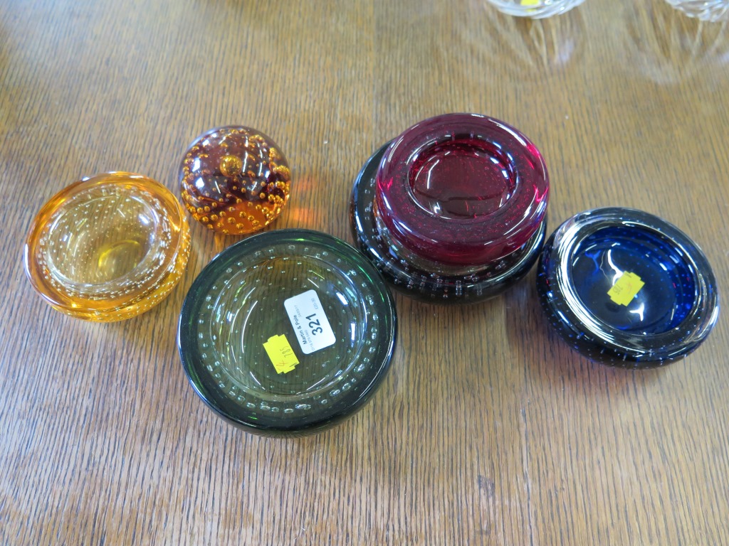 Five various Whitefriars coloured bubble effect glass ashtrays and a damaged amber glass paperweight