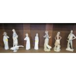 Two Lladro figures of girls feeding geese, 24cm high, two other Lladro figures and four other