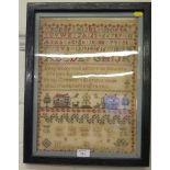 A Victorian needlework sampler, by Margaret Reid dated 1846, with alphabet, four line verse and
