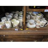 A collection of Royal Commemorative mugs, including George V Coronation