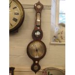 A Regency painted rosewood banjo barometer, with hygrometer, thermometer, convex mirror and silvered