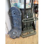 A Victorian cast iron umbrella stand with rosettes and beaded frame 68cm high, and a cast iron