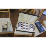 A cased set of six Royal Doulton Imperial blue pattern coffee cans and saucers, (one can broken) a