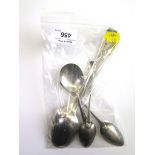 A pair of Newcastle silver tea spoons and three other silver spoons