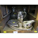 A collection of silver plate, to include a tray, a sauce boat, a water jug, two glass decanters, etc