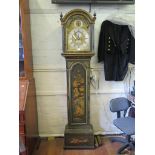 A George III green lacquer longcase clock, the domed hood over an arched trunk door and plinth