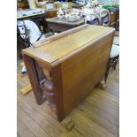 An oak drop leaf table, 89cm wide, a pair of oak dining chairs and two pairs of bedroom chairs To be