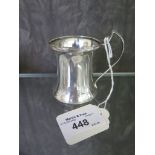 A small waisted silver mug (marks rubbed)