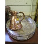 A copper conical jug, 18cm high, a silver plated on copper tray 44cm wide