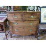 A George III mahogany bowfront chest of drawers, with two short and two long graduated drawers on