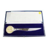 A Garrard silver paper knife, boxed