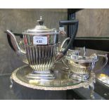 A four piece silver plated tea set and tray
