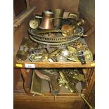 A large collection of brass and copperwares