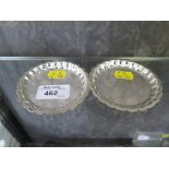 A pair of small silver dishes