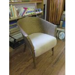 A Lloyd Loom Lusty tub armchair