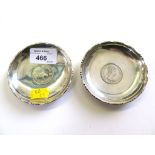 Two small silver dishes with Hong Kong coins set into the bases