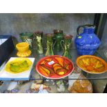 Three Poole Pottery Delphis range dishes, a Denby ware blue glaze vase, Torquay ware vases and other