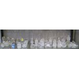 A large collection of glass mustard pots