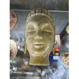 A soapstone Buddhist mask, 15.5cm high