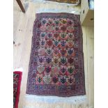 Two Turkoman rugs, 122cm x 86cm and 106cm x 56cm, a prayer rug 116cm x 68cm