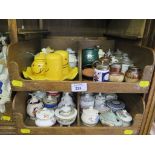 Two trays of pottery and porcelain mustard pots