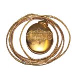 A Mizpah locket, a cross and six metal bangles