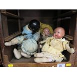 Three early 20th century dolls and three soft toys