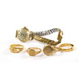 Four gold rings and a gold ladies wristwatch (scrap)
