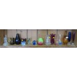 Two glass elephant ornaments and various coloured glass vases