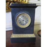 A 19th century French slate and ormolu mantel clock, of rectangular form with silvered dial