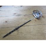 A Georgian silver punch ladle with whale bone handle
