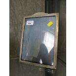 A silver photograph frame 23cm x 17.5cm