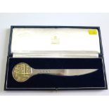 A Garrard silver paper knife, boxed