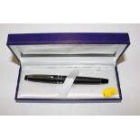 A boxed Waterman fountain pen