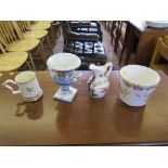 A Sylvan ware musical mug decorated with flowers and gilding together with three other porcelain