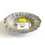 An oval silver sweet meat dish with pierced decoration