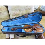 A violin with paper label inscribed Antonius Stradiuarius, two piece back, length of back 36cm, a
