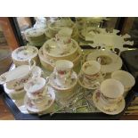 A Royal Albert Moss Rose part tea and dinner service for eight place settings and a commemorative