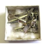 A nineteen piece dolls house silver cutlery set